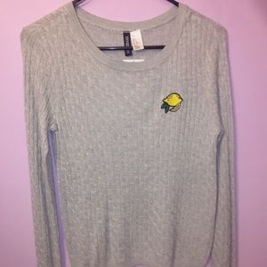 Cute Grey Sweater with a lemon sticker on it
